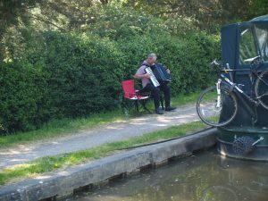 Random canalside accordion player